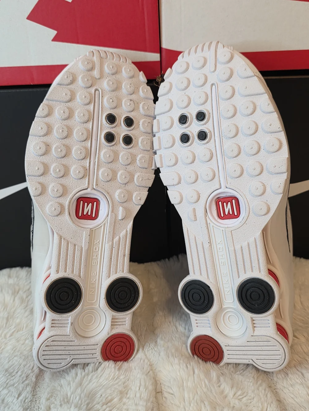 Nike White Sneakers with Red Shox and Black Swoosh
